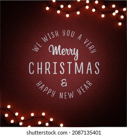 Christmas garland on a dark red knitted background. Square Christmas card. 