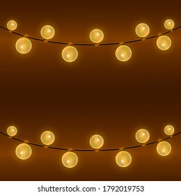 Christmas garlands on a brown background. Banner with garlands of yellow bulbs.