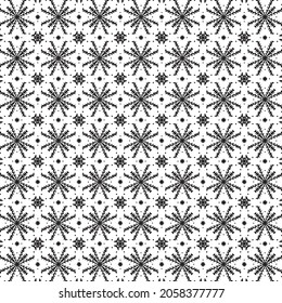 Christmas geometric pattern with snowflakes. Modern stylish texture on a white background. Winter geometric pattern. Simple graphic design. Vector.
