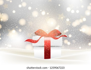 Christmas gift background with glossy red bow nestled in snow