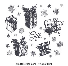 Christmas gift box hand drawn vector icons set. Vintage sketch doodles of present with bow and ribbon. Holiday decoration elements for New Year greeting cards design