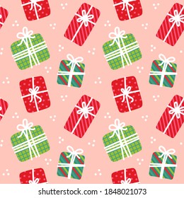 Christmas gift box parcels seamless pattern. Colorful festive wrapping paper in green, red, pink and white. Distance gift holiday mail illustration.