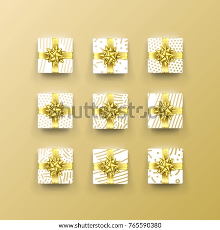 Christmas gift box present in golden ribbon bow and wrapping paper dotted gold foil pattern. Luxury Christmas gift boxes set for Birthday, New Year holiday greeting card vector black background