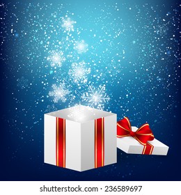 Christmas gift box with shiny snowflakes