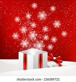 Christmas gift box with shiny snowflakes
