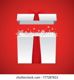 Christmas gift box with shiny snowflakes