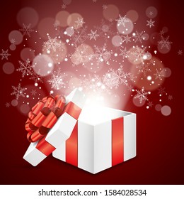 Christmas gift box with snowflake and bokeh light