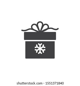 Christmas gift box with snowflake vector icon. filled flat sign for mobile concept and web design. Gift box with ribbon bow glyph icon. Symbol, logo illustration. Vector graphics