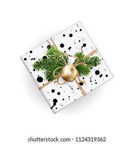 Christmas gift box top view. Realistic illustration. Black and white wrapping paper. Decoration of Christmas toys and Christmas branches. EPS10.