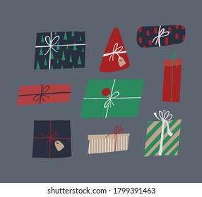 Christmas gift boxes set. Cute flat presents with ribbon, bow and label. Hand drawn cartoon vector illustration of surprise xmas giftboxes.