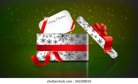 Christmas gift on red background with snow and snowflakes. Merry Christmas Vector illustration. EPS 10