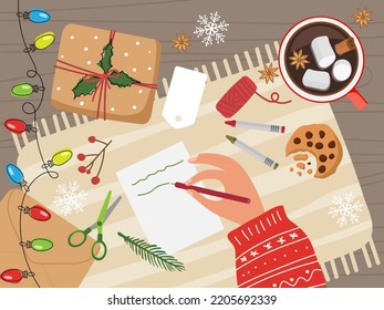 Paquete de regalo de Navidad. Preparaciones para el vector de Navidad y Año Nuevo aislado. Mano con suéter cálido escribiendo felicitaciones. Accesorios de creatividad y dulzura. Decoración de vacaciones de invierno.