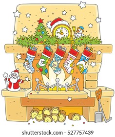 Christmas gift socks hanging over the decorated fireplace