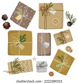 Christmas gifts in kraft paper set top view.Vector isolated illustration.DIY rustic present boxes in craft wrappings with twine bows and fir branches,dried orange slices.Eco decoration