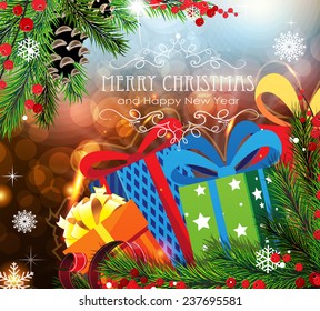 Christmas Gifts on abstract background with sparkling lights and fir branches