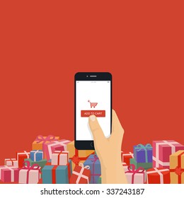 Christmas gifts online shopping. Hand holding mobile phone with add to cart button, modern flat design illustration.