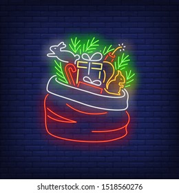 Christmas gifts in sack neon sign. Bag, fir tree, forest animals, squirrel. Vector illustration in neon style for topics like Xmas, New Year, giving presents
