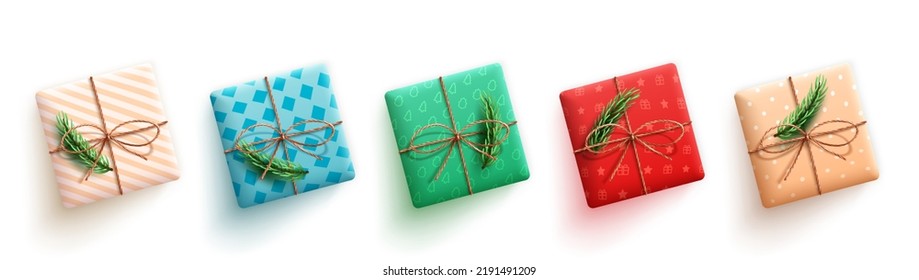 Christmas gifts vector set. 3d realistic gift with twine ribbon, pine leaves and wrap pattern in colorful collection characters for xmas present design. Vector illustration.
