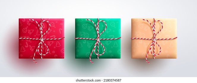 Christmas gifts vector set design. Christmas gift boxes wrapped with minimalist pattern and twine ribbon in top view for 3d present decoration collection. Vector illustration.
