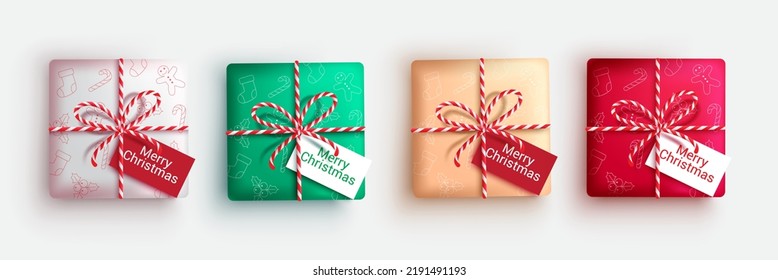 Diseño de conjuntos vectoriales de regalos de Navidad. Cajas de regalo de Navidad con patrón de navidad, cinta de dos y tarjeta de saludo de navidad navideña para el diseño de la colección de regalos de temporada. Ilustración vectorial. 

