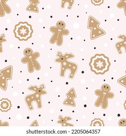 Christmas gignerbreads seamless pattern on light pink background.