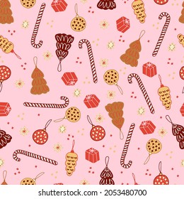 Christmas gingerbread cookies and pastries in the form of fir trees and Christmas balls striped lollipops canes and stars vector seamless pattern. Isolated sweets for the new year. Winter background 