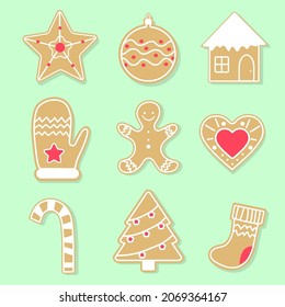 Christmas gingerbread cookies set on green background. Christmas tree and star, heart and house EPS