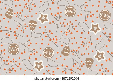 Christmas gingerbread. Figured cookies in the shape of a snowflake and a Christmas tree. Red berries, pattern. Holiday sweets.
