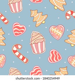 Christmas gingerbread in the form of muffin, heart, lollipop and fir tree with snow on light calm blue background. Seamless cookie doodle winter pattern. Suitable for packaging, textile, wallpaper. 