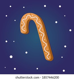 Christmas gingerbread in the form of a sweet stick on a blue background. Traditional pastries for Christmas and New year.