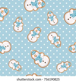 Christmas gingerbread seamless pattern. Ginger cookies on polka dot blue background. Vector illustration.