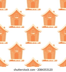 Christmas gingerbread seamless pattern with gingerbread houses on green background