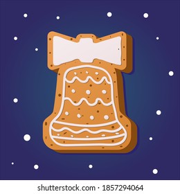 Christmas gingerbread in the shape of a bell on a blue background. Traditional pastries for Christmas and New year.