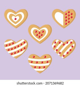 Christmas gingerbread in the shape of a heart. Sand-colored gingerbread cookies with white and red decor. Elements for your New Year's design