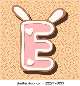 Christmas gingerbread in the shape of the letter with rabbit ears, white pink glaze, hearts