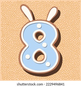 Christmas gingerbread in the shape of the namber with rabbit ears, white blue glaze, polka dots