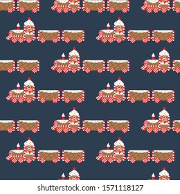 Christmas gingerbread train vector seamless pattern on the blue background. Vector illustration