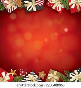 Christmas glass ball and giftbox red background with space for text.