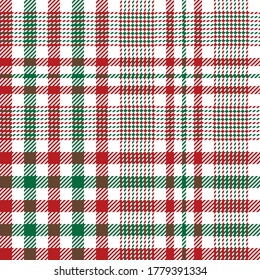 Christmas glen fabric. Red, green, white tartan textured check plaid for tablecloth or other modern New Year winter holiday textile design.