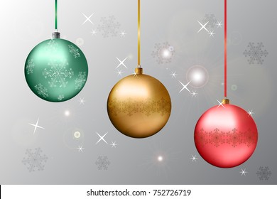 Christmas globes in different colors with snowflakes on grey background