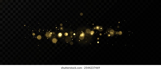 Christmas glowing bokeh. A blur of sparks and golden stars sparkle with a special light. Golden bokeh effect.