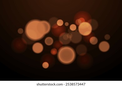 Christmas glowing bokeh. Blurred golden bokeh on a black background. Blurry circles. Shine, sparks and dust.