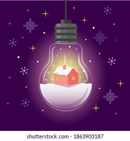 Christmas glowing lamp with a snow-covered house inside and falling snowflakes.