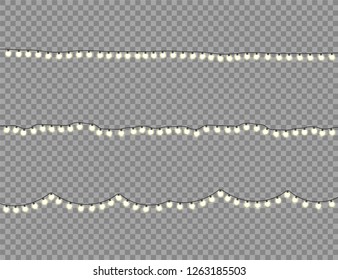 Christmas glowing lights. Garlands with colored bulbs. Xmas holidays. Christmas greeting card design element. New year,winter.