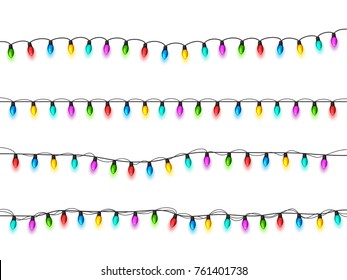 Christmas glowing lights on white background. Garlands with colored bulbs. Xmas holidays. Christmas greeting card design element. New year,winter.