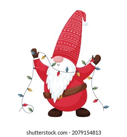 A Christmas gnome with a beard in a red hat holds a festive garland with light bulbs in his hands. New Year's cute cartoon character isolated on a white background