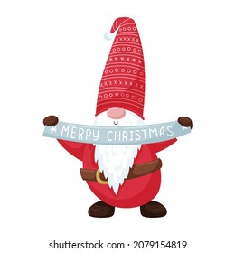 A Christmas gnome with a beard in a red hat holds a ribbon with the words Merry Christmas in his hands. New Year's cute cartoon character isolated on a white background