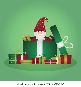 Christmas gnome in a gift box. New Year's gifts from Santa Claus. Christmas card