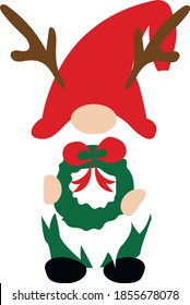 Christmas gnome in red hat with Christmas decorations