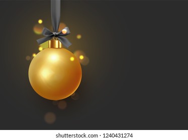 Christmas golden balls. Festive xmas decoration gold bauble, hanging on the ribbon
